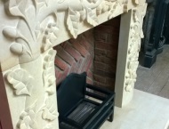 Bespoke Hand-Carved Stone Fireplace with Acorn Artwork 11